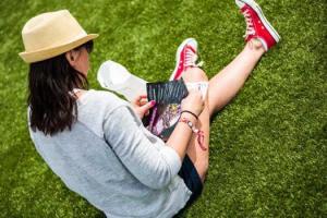 Woman-Enjoying-Artificial-Grass